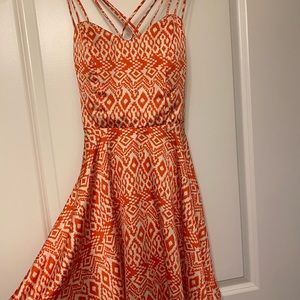 Occasion dress in coral and white. Silk feel